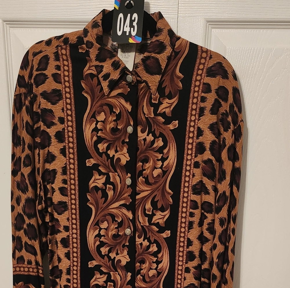#43 SMW Long sleeve animal print blouse.